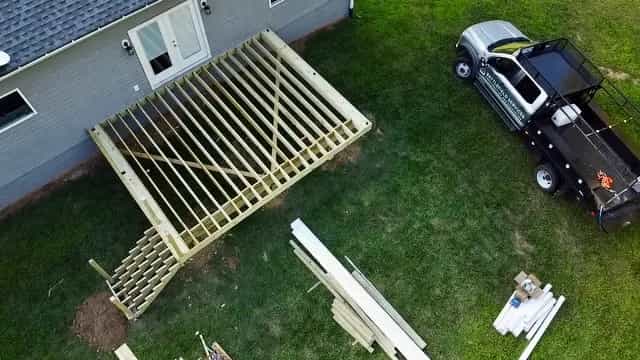 Deck framing under construction before decking boards are installed in Culpeper