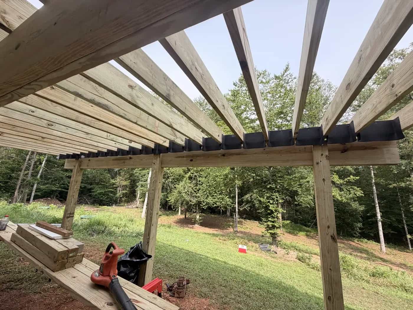 RainGuard under-deck system framing between joists on a raised Trex deck project in Culpeper VA