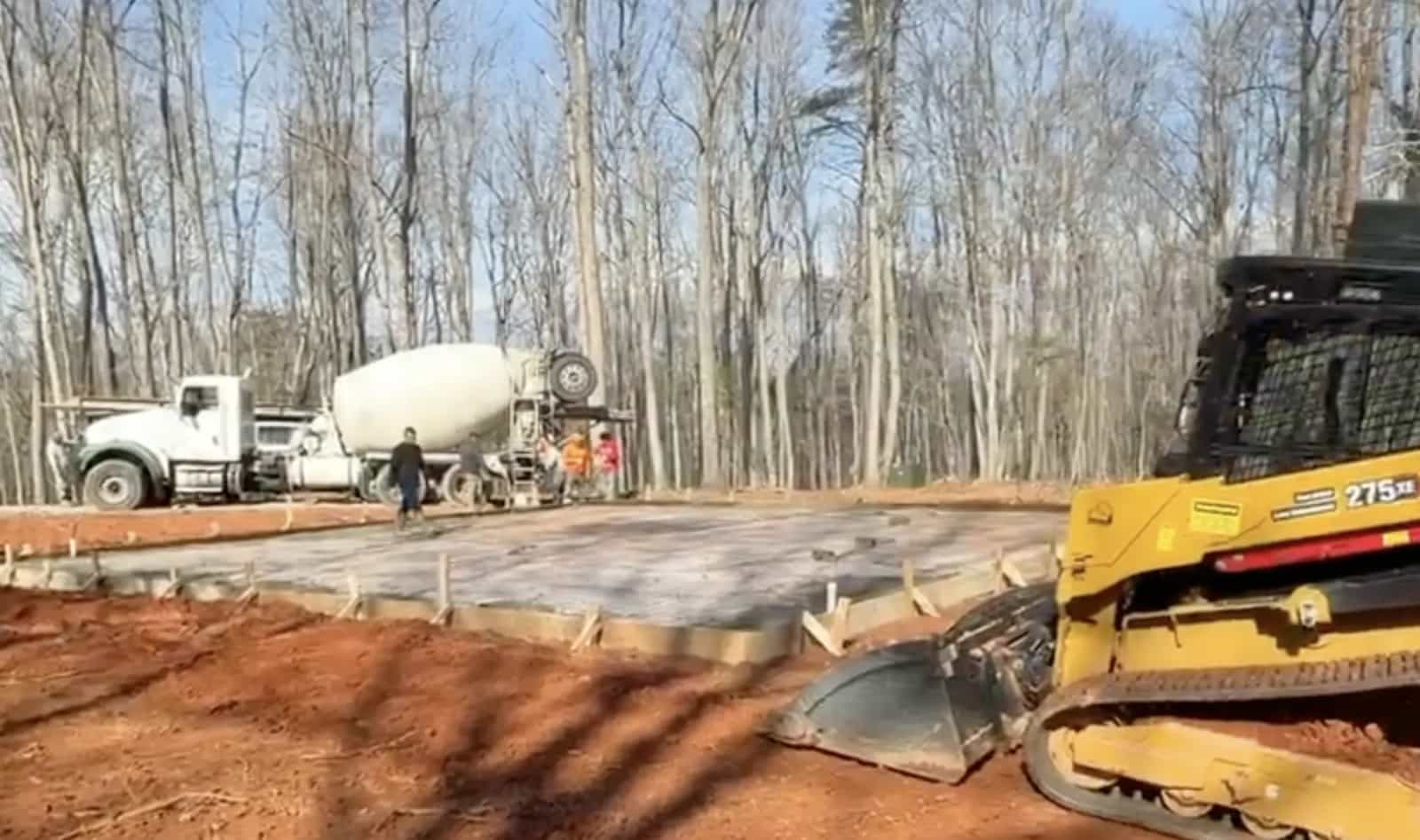 Finished concrete slab with saw-cut control joints for a 40x40 metal garage foundation in Culpeper VA