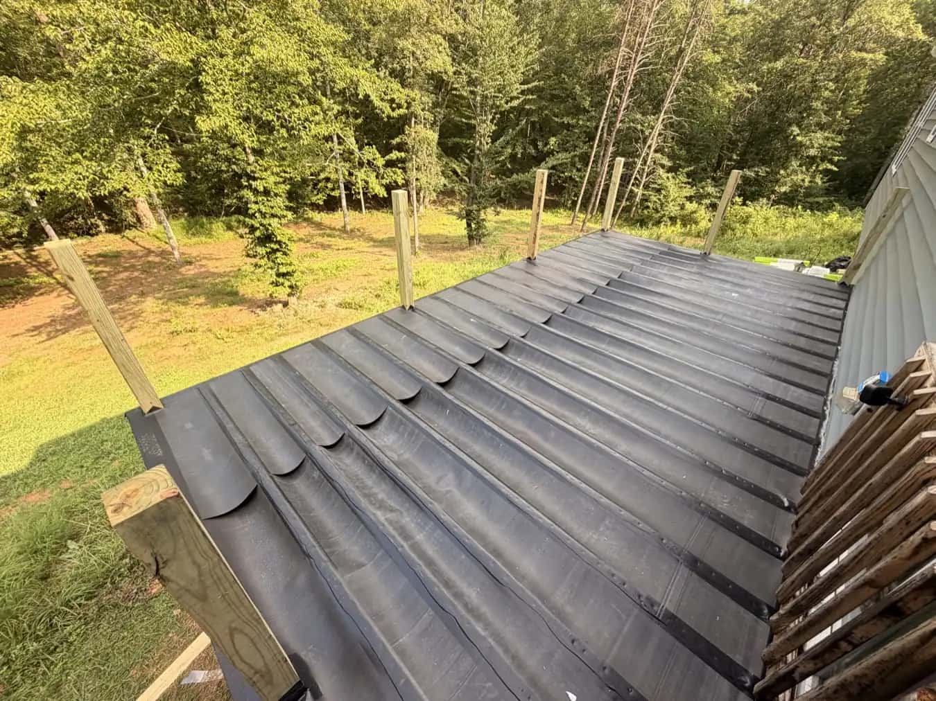 Aerial view of a 10x20 Trex Pebble Beach deck with white railing and black balusters in Culpeper VA