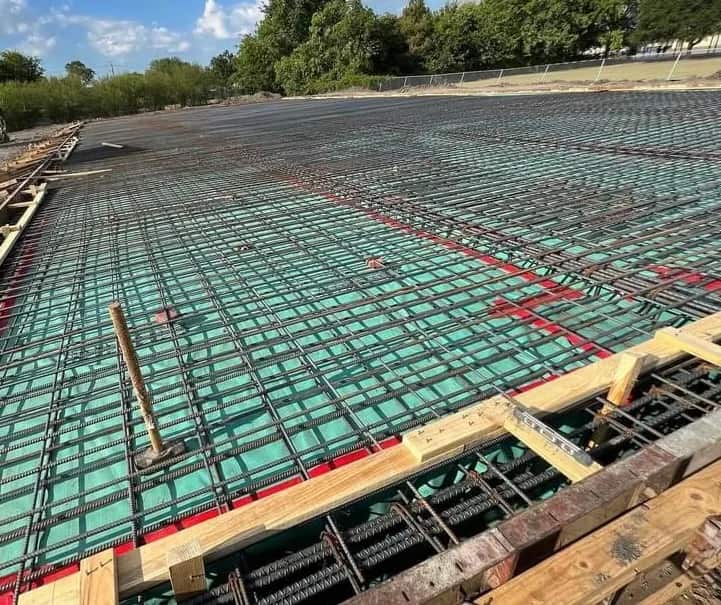 Concrete reinforcement grid prepared for a monolithic foundation pour