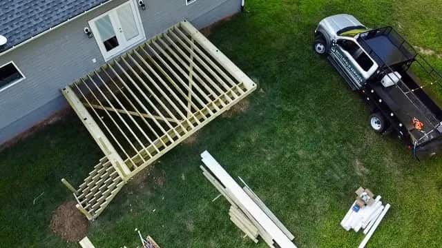 Deck framing under construction before decking boards are installed