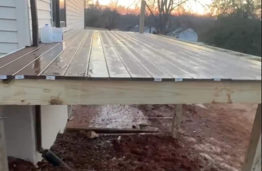 Saddle Brown deck boards during installation