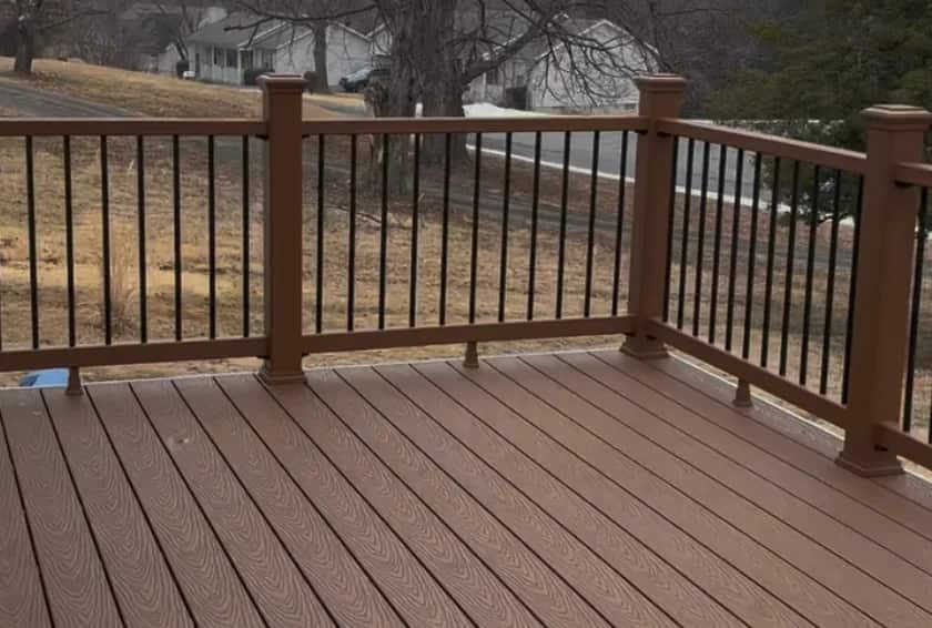 Brown handrails and black balusters on the finished Warrenton deck