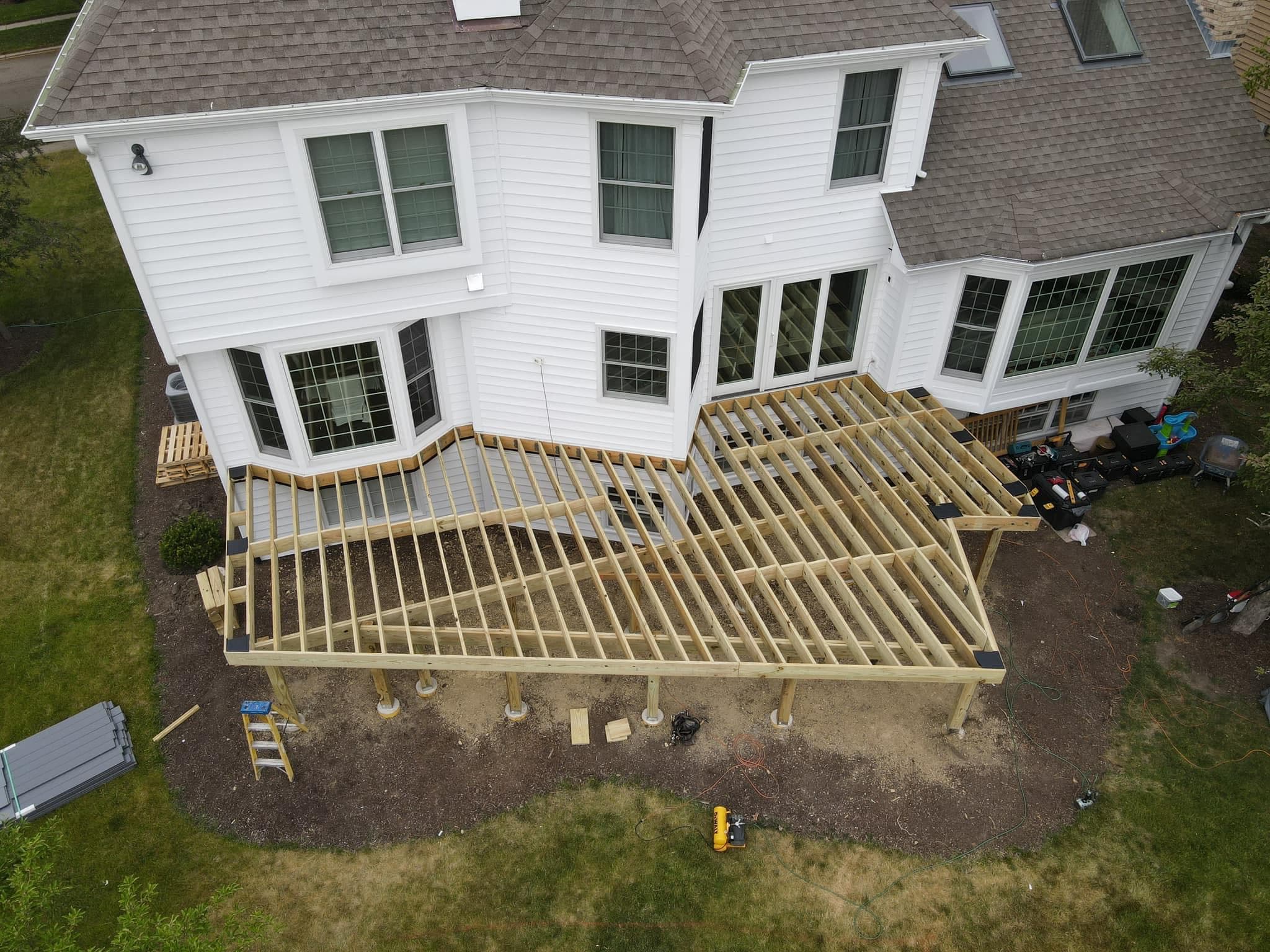 Custom deck framing viewed from above during construction