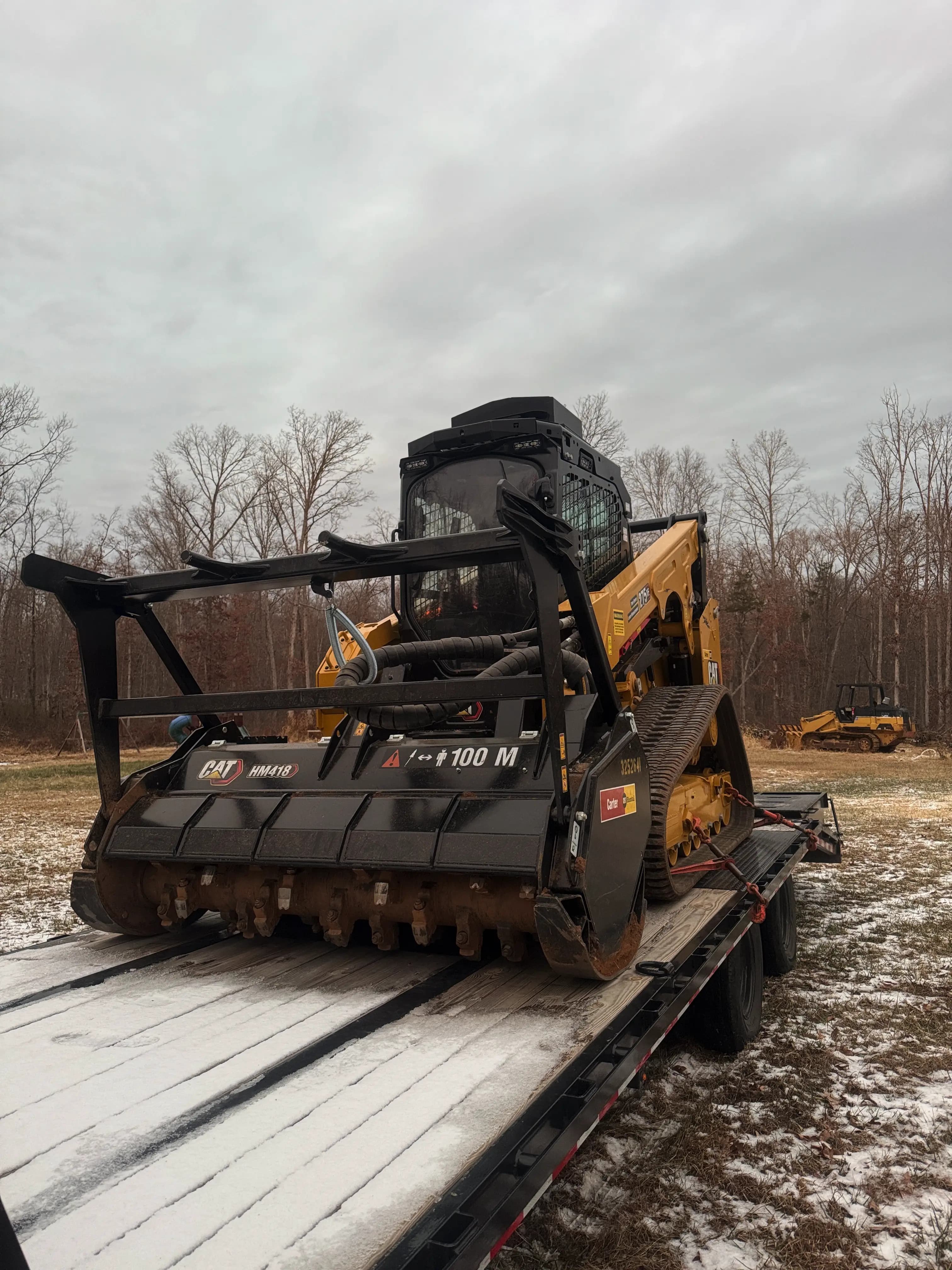 Caterpillar 275 XE forestry mulcher attachment loaded on a trailer in Culpeper, VA