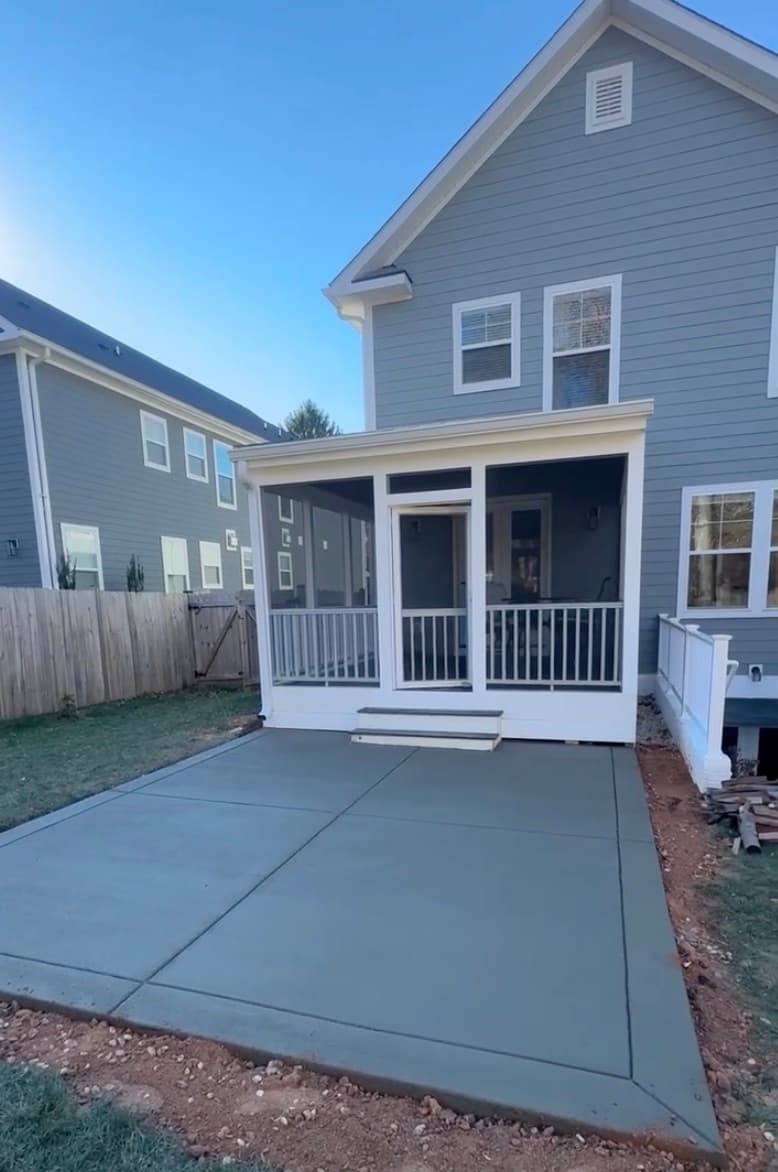 Finished screened porch with concrete patio connection
