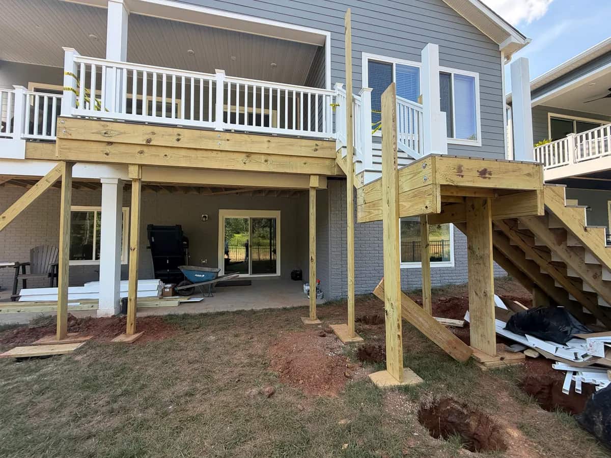 Construction detail: new posts and framing for the extension, stairs and mid-landing