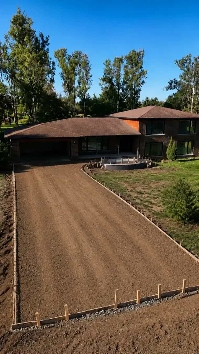Graded base preparation for a concrete driveway project in Culpeper VA
