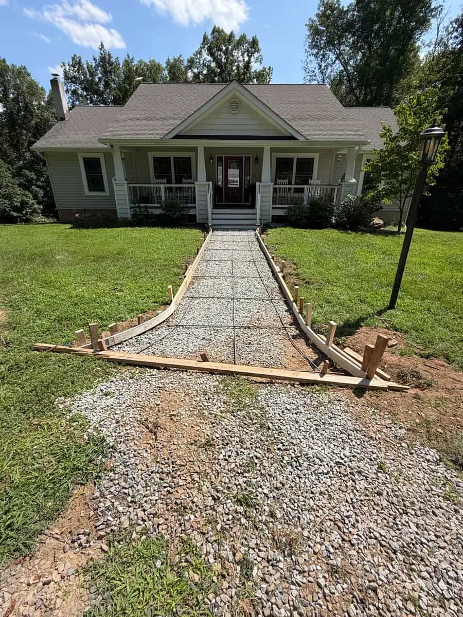 Formed gravel base for a stamped concrete sidewalk leading to a Culpeper VA front porch