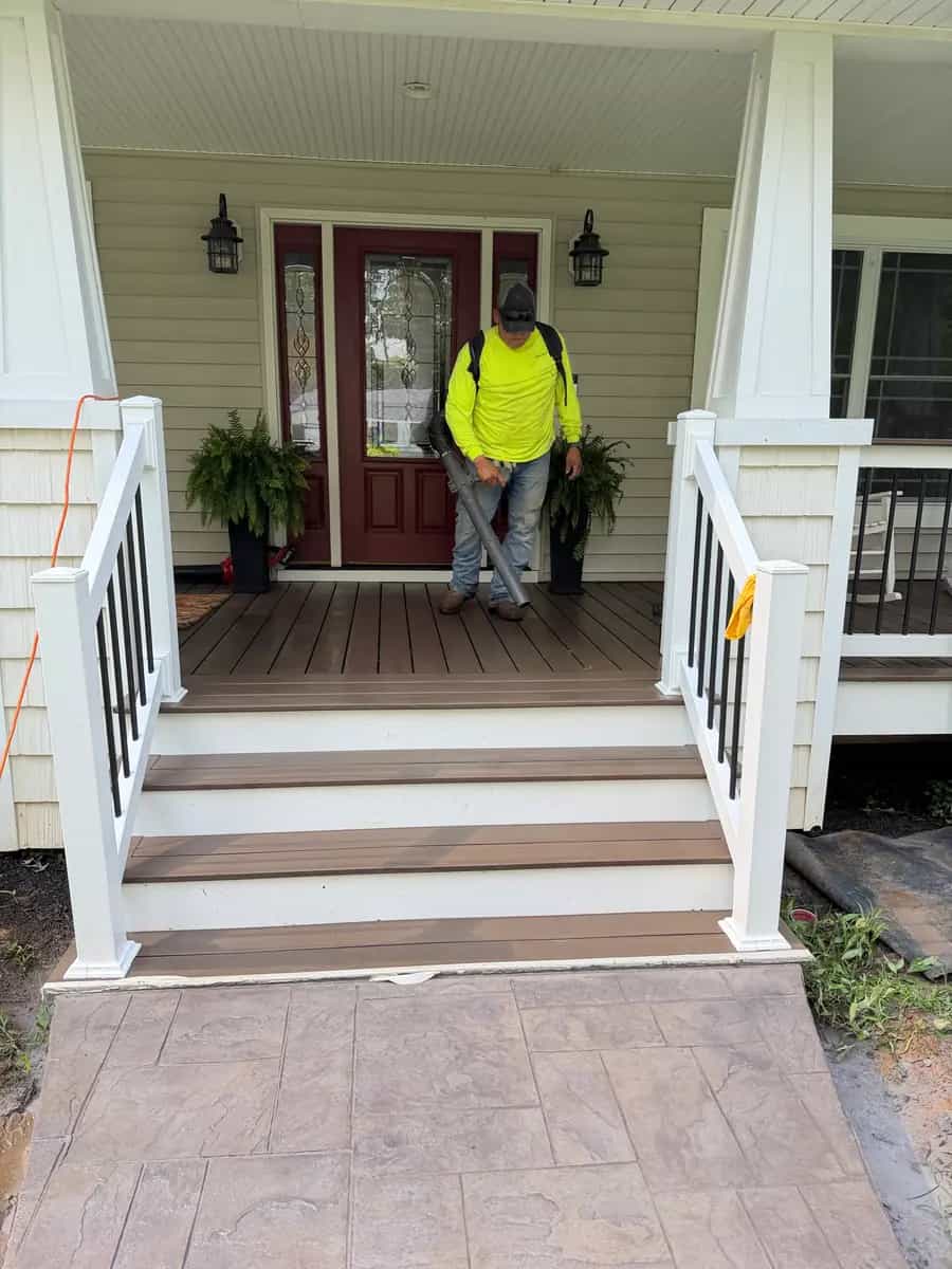 Stamped concrete sidewalk connection at the front porch steps of a Culpeper home
