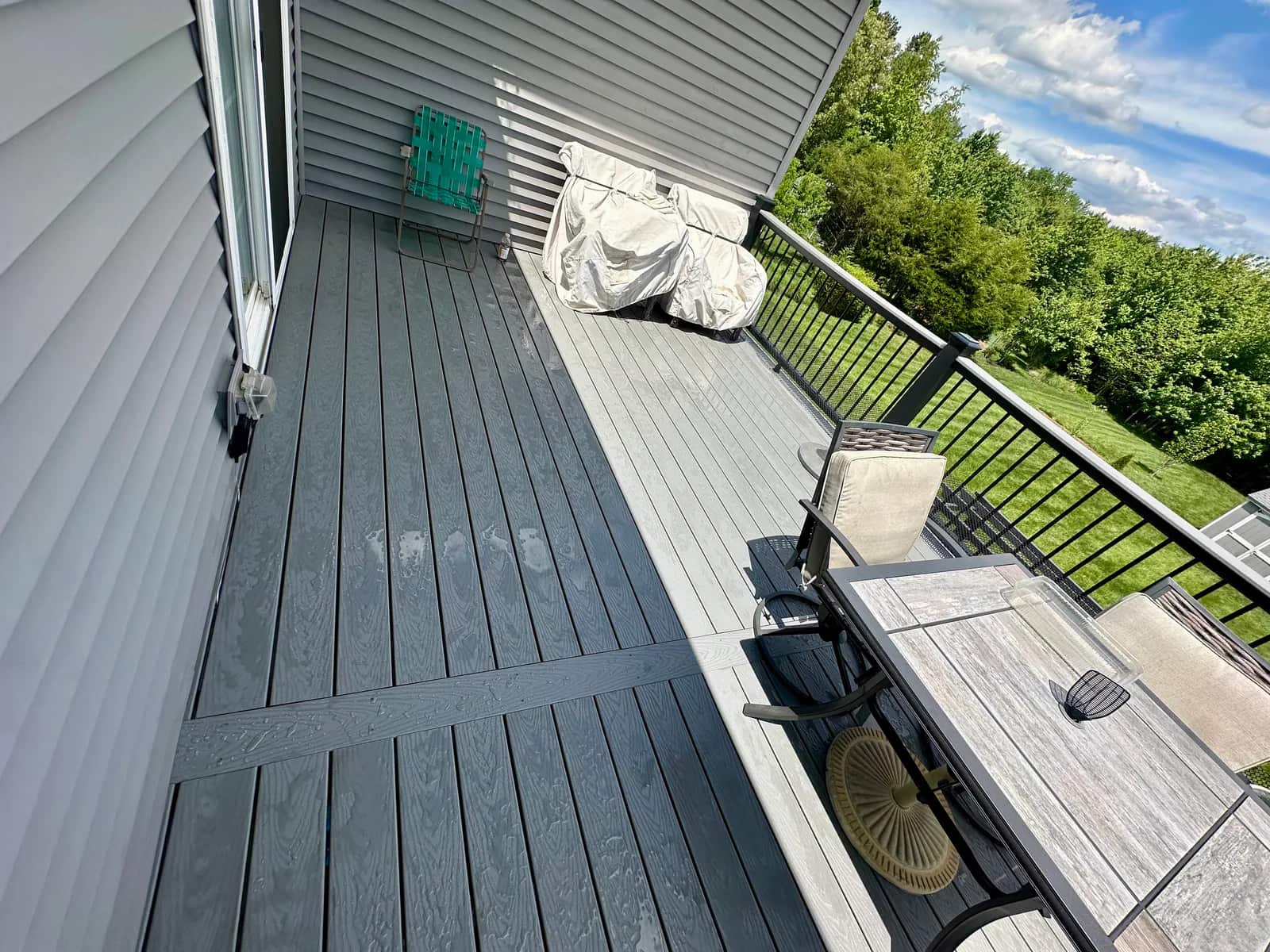 Trex Select Pebble Grey composite deck boards with picture frame border on Orange VA resurfacing project