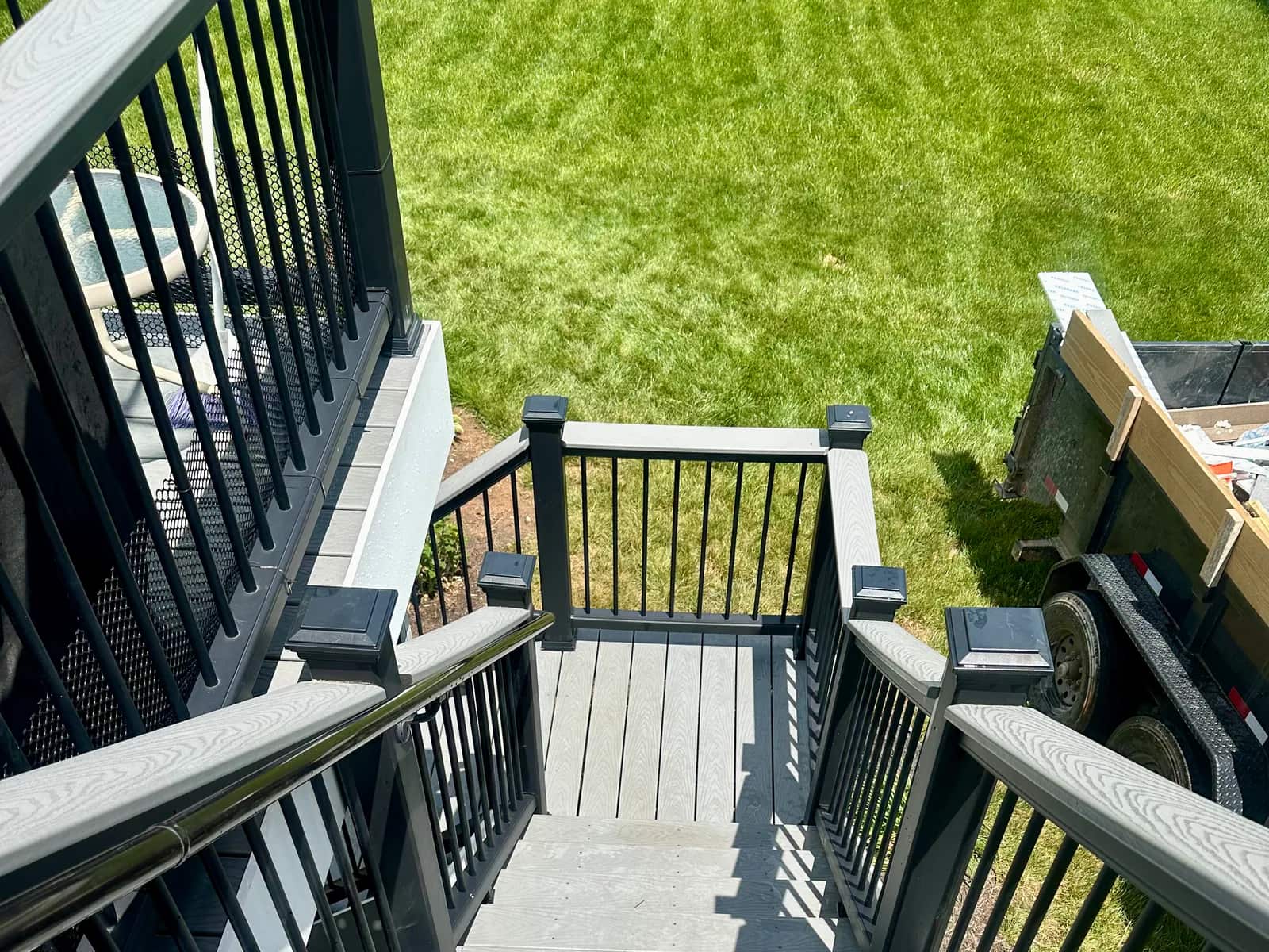 Resurfaced deck stairs finished with Trex Select Pebble Grey in Orange VA