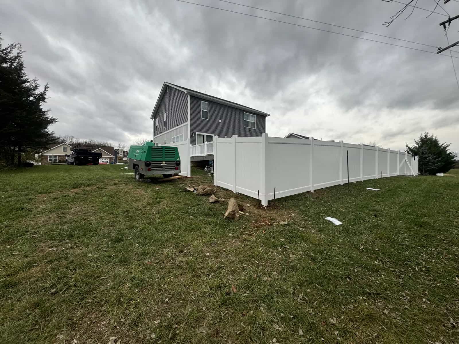 Backyard privacy fence project in Culpeper VA with clean fence line and finished installation