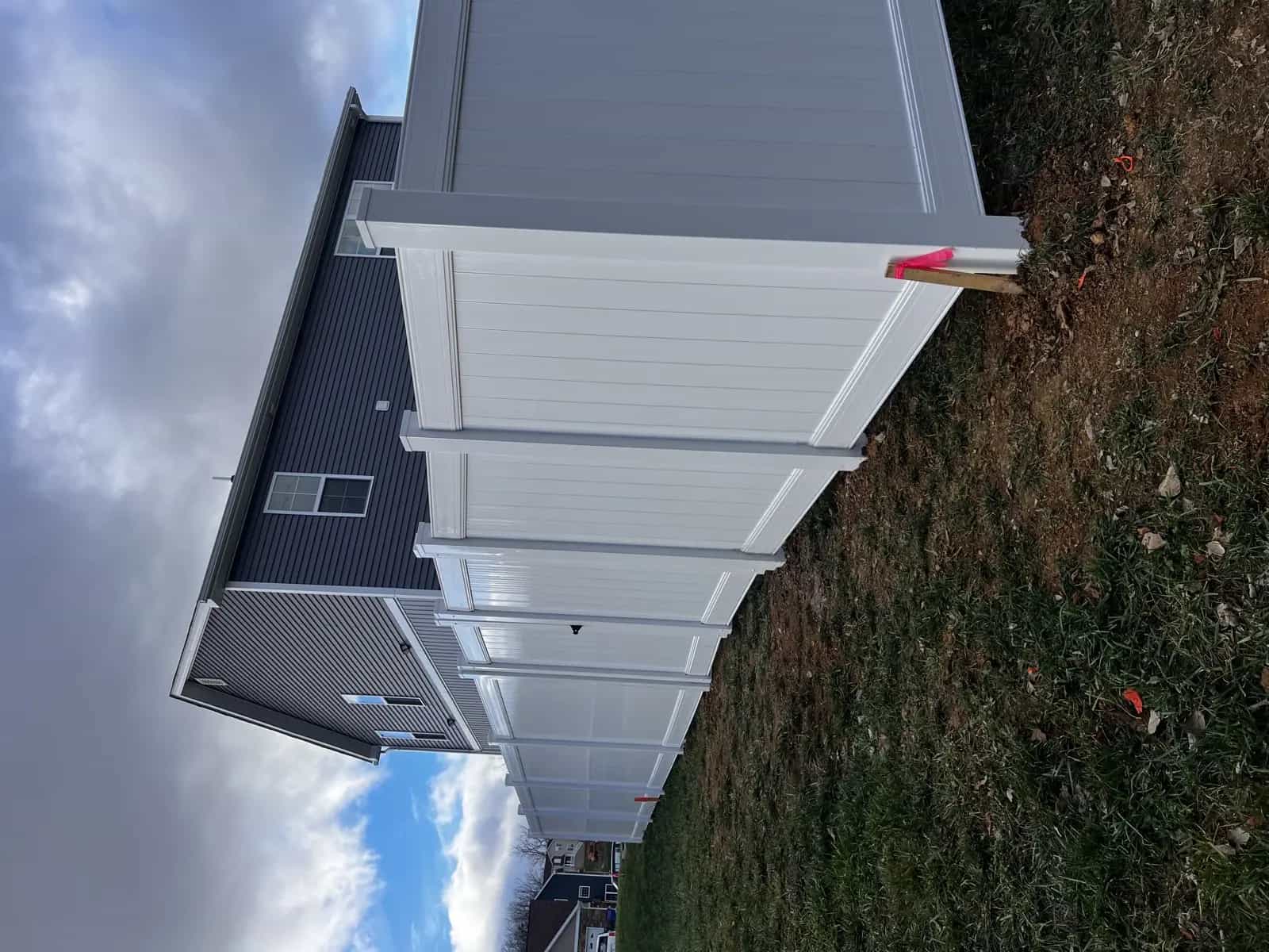 Corner detail of a completed wood privacy fence installation in Culpeper VA