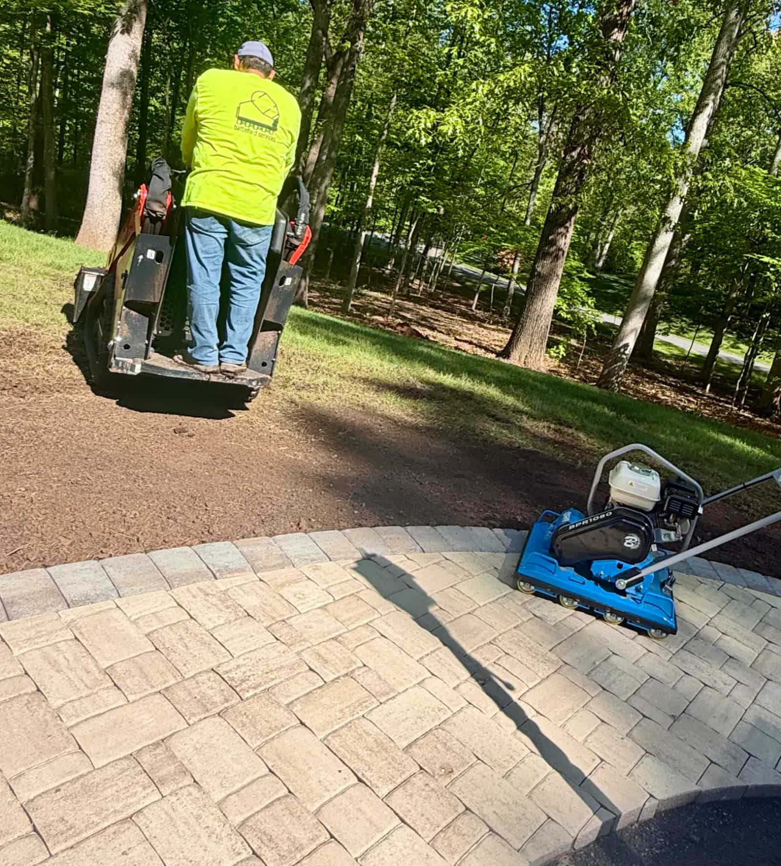 Bartell BPR1080 compactor on a paver patio during hardscape installation
